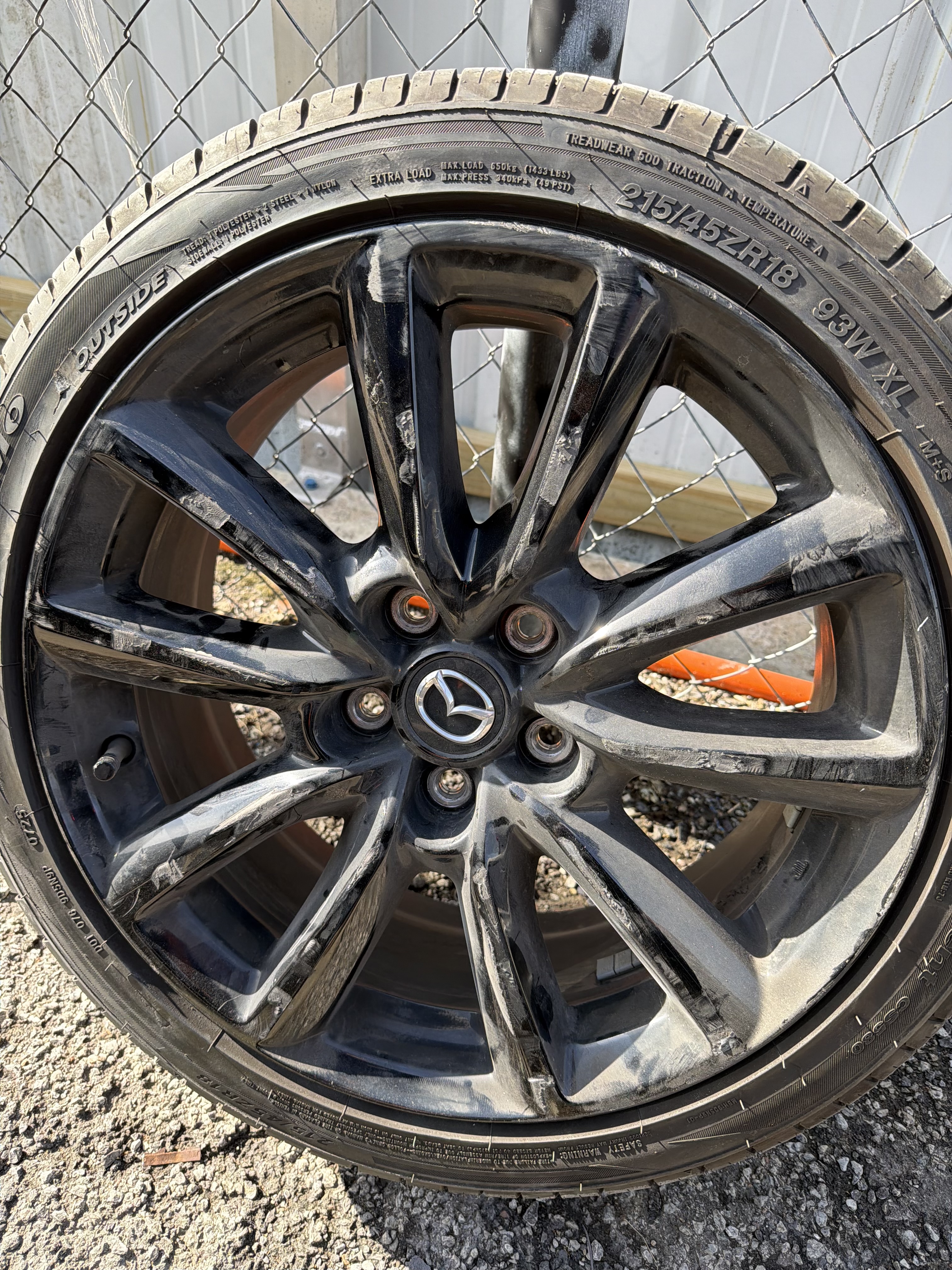Mazda wheel repair before curb rash damage
